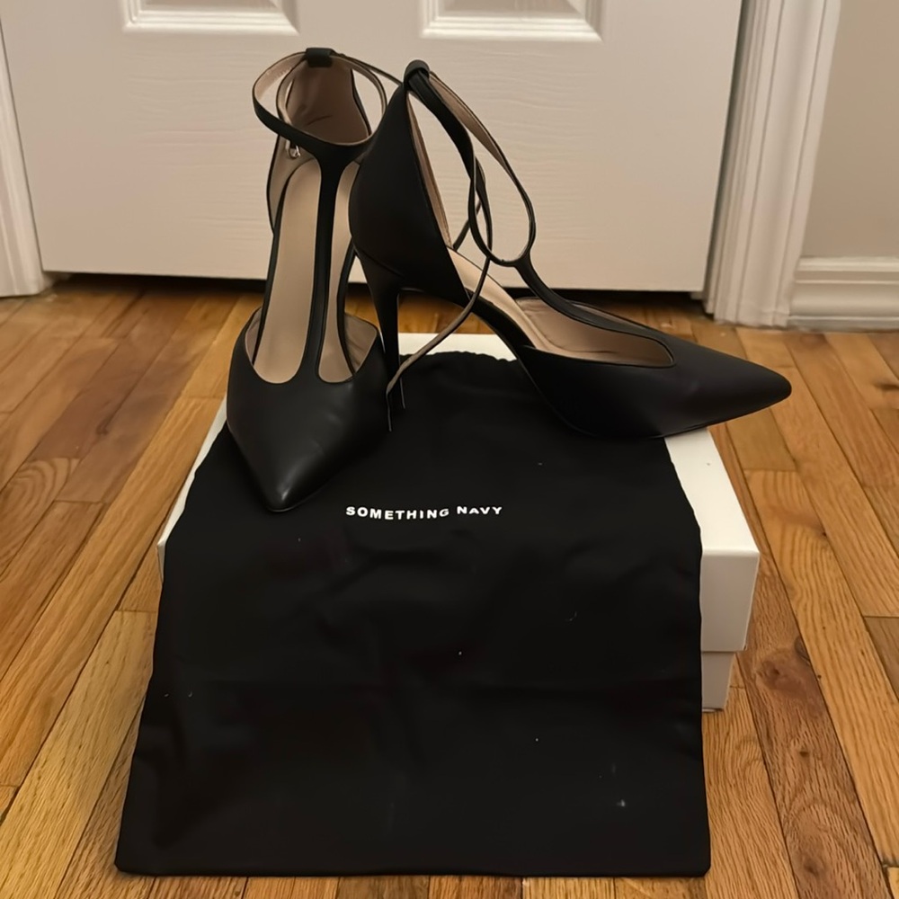 Black strappy heels, gently worn. Size 8.5